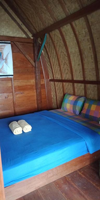Postel nebo postele na pokoji v ubytování Eco-tourist Dreamstay Treehouse