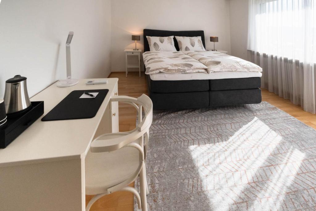 Postel nebo postele na pokoji v ubytování Aparthome L.I.N.Z.