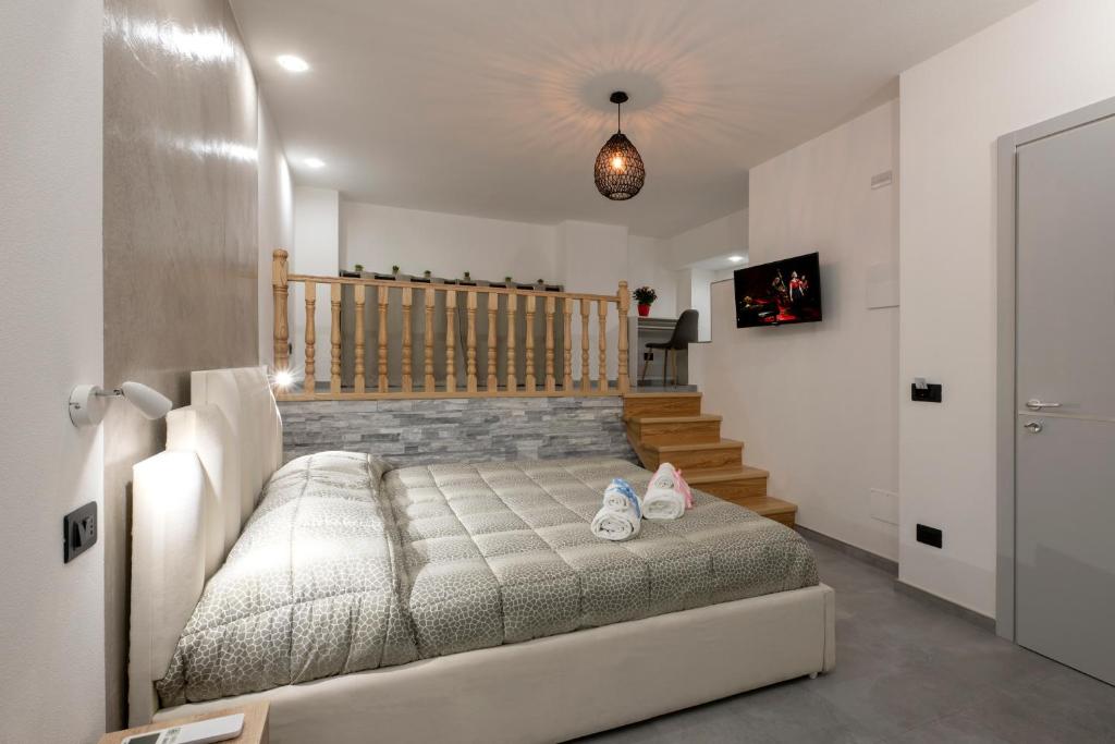Postel nebo postele na pokoji v ubytování SABRILUNA ROOMS