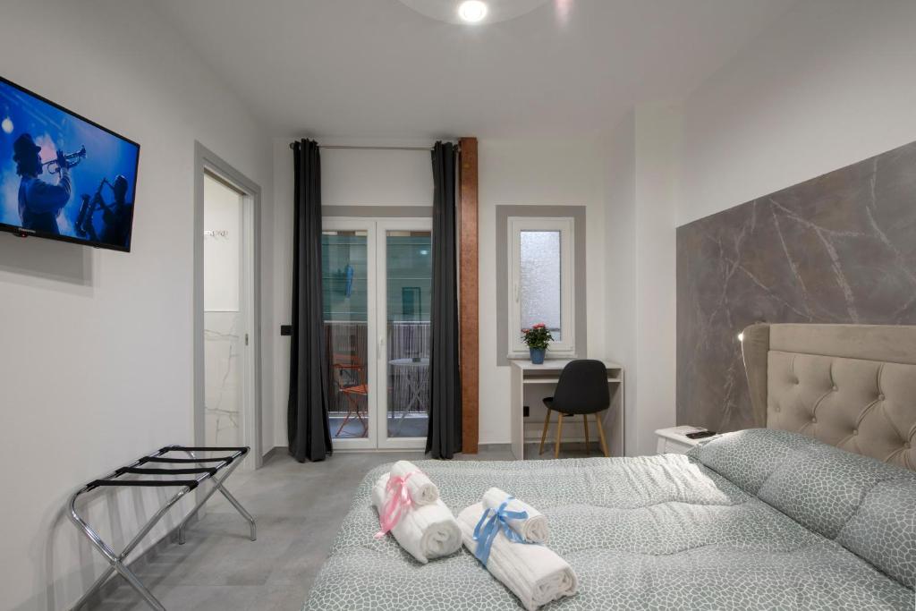 TV a/nebo společenská místnost v ubytování SABRILUNA ROOMS