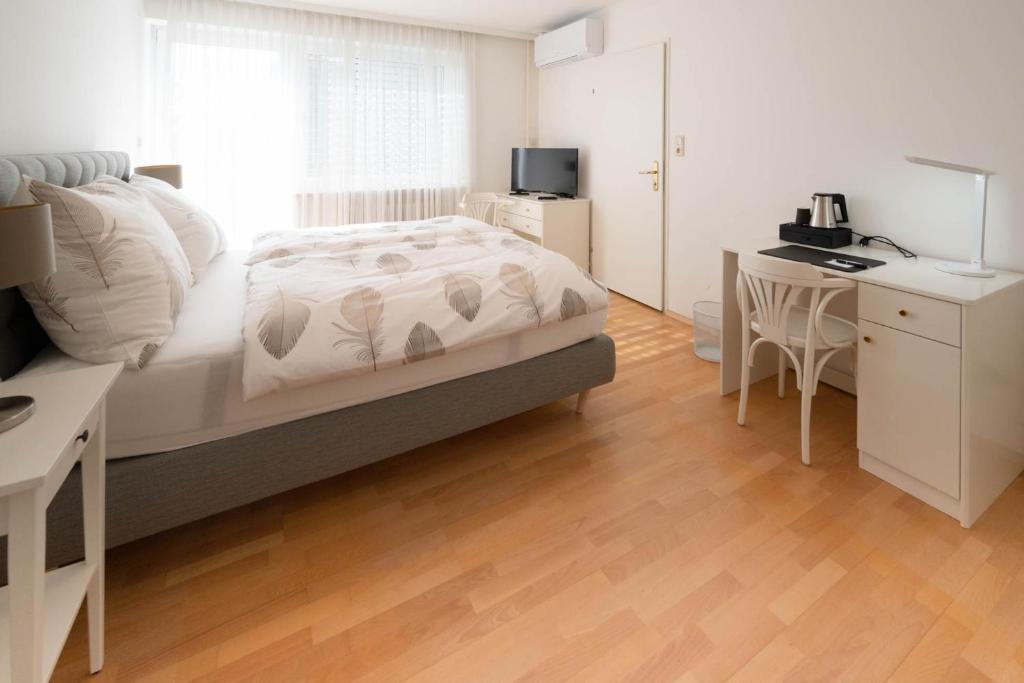 Postel nebo postele na pokoji v ubytování Aparthome L.I.N.Z.