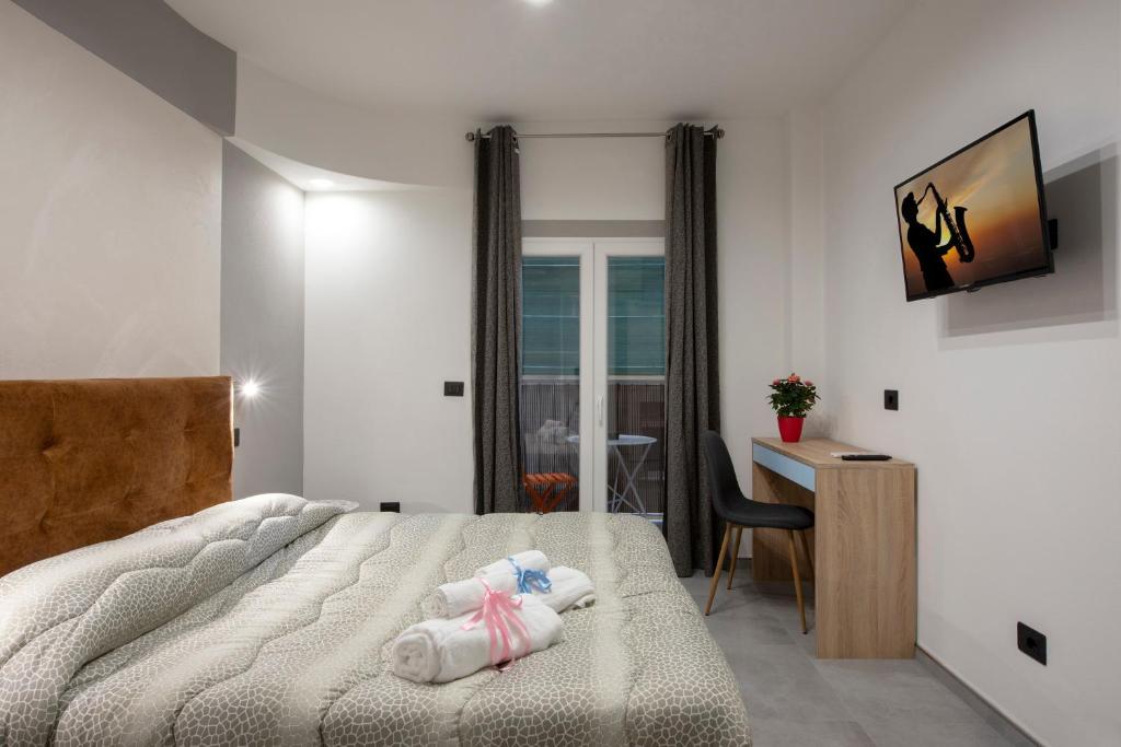 Postel nebo postele na pokoji v ubytování SABRILUNA ROOMS