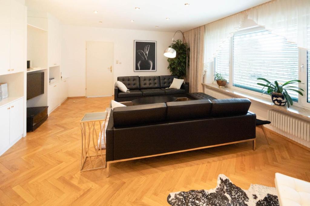 Posezení v ubytování Aparthome L.I.N.Z.