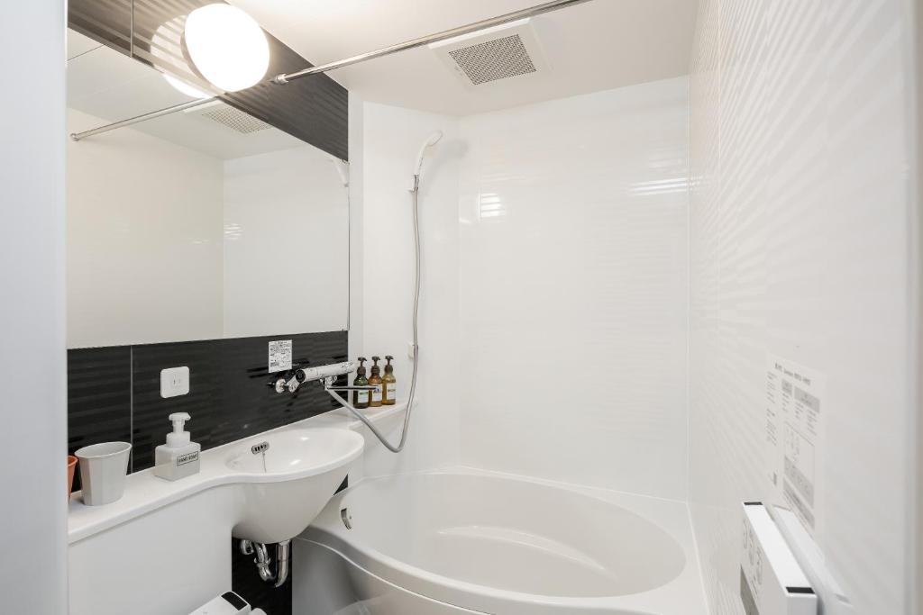 Koupelna v ubytování M's Hotel Nijojo Oike
