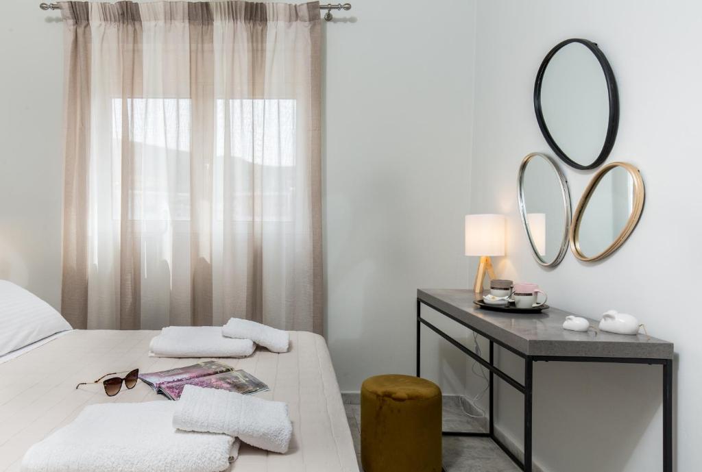 Postel nebo postele na pokoji v ubytování NK Apartments