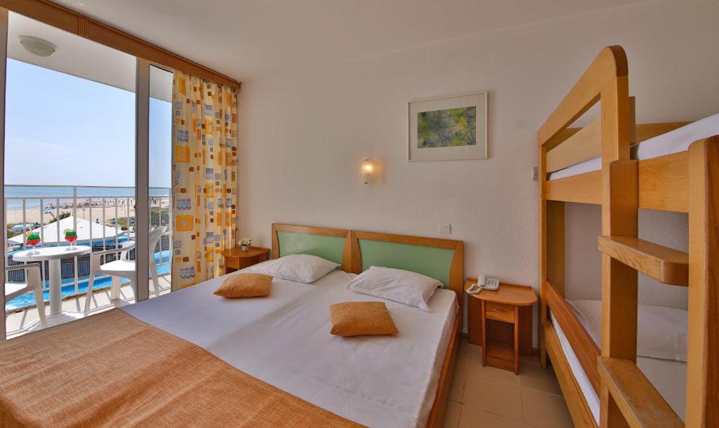 Postel nebo postele na pokoji v ubytování Hotel Elitsa
