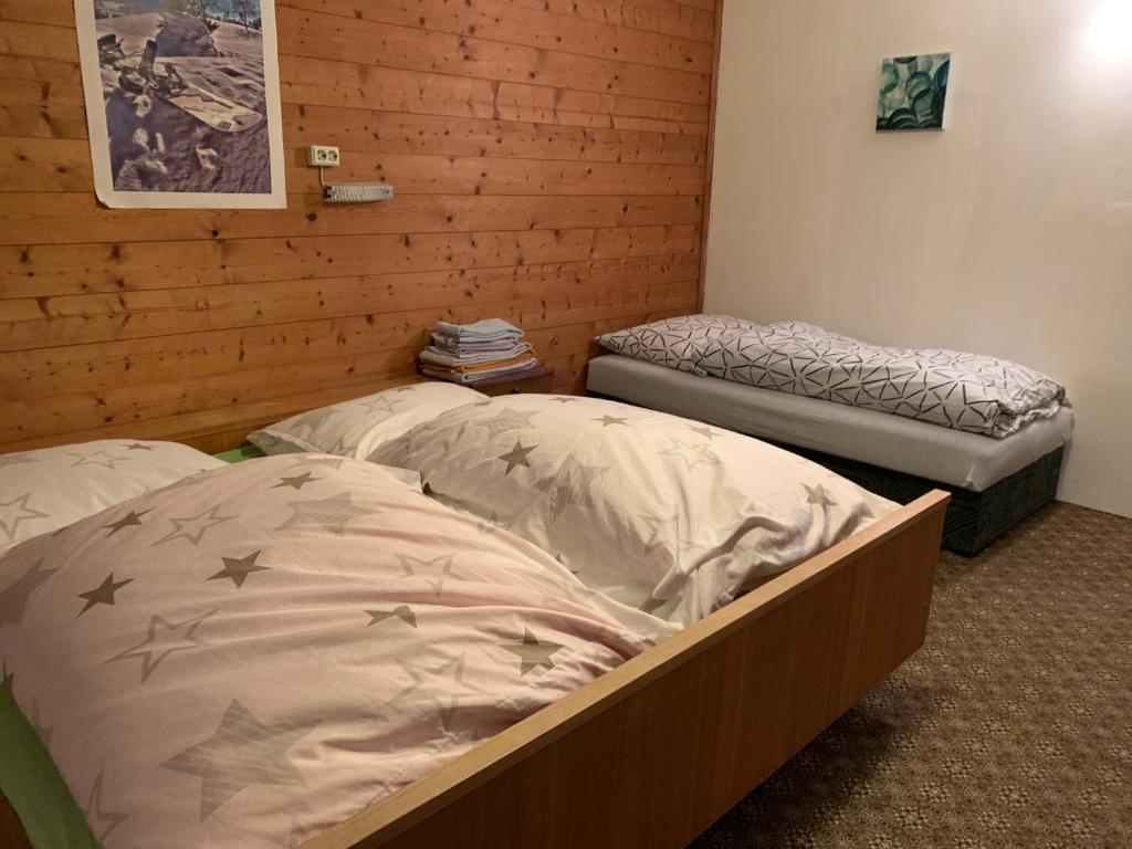Postel nebo postele na pokoji v ubytování Mountain Blast