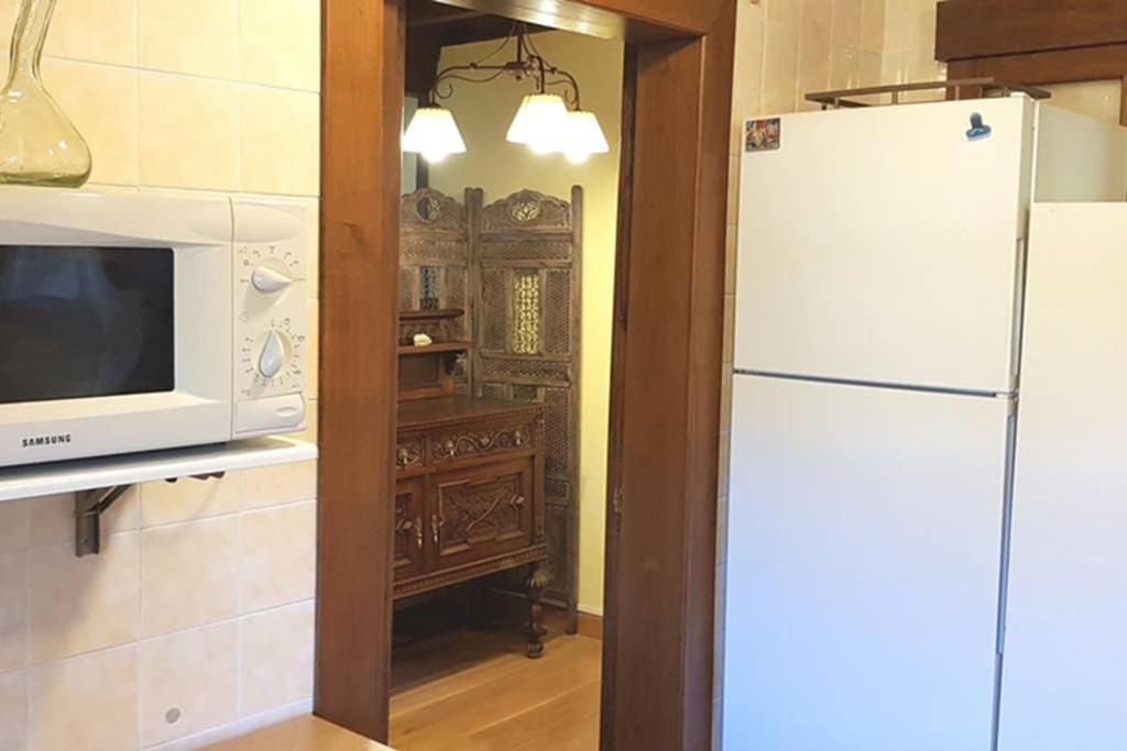 Kuchyň nebo kuchyňský kout v ubytování Casa la Capilla