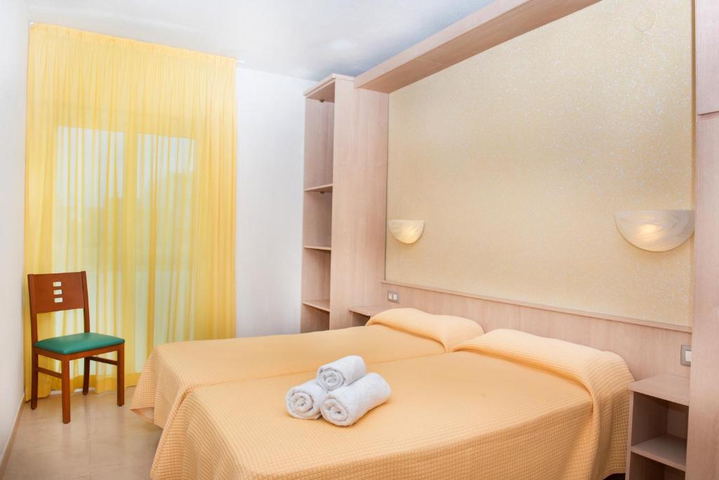 Posteľ alebo postele v izbe v ubytovaní Apartaments Costa d'Or