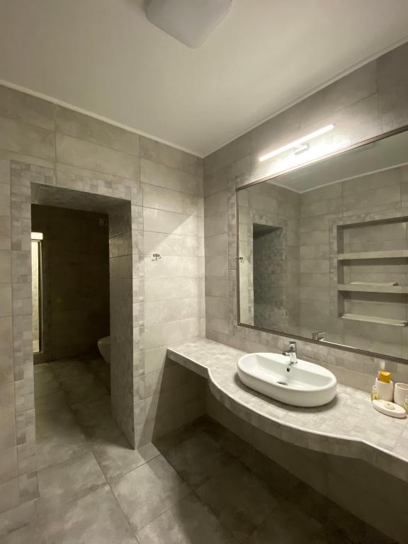 Koupelna v ubytování Hotel Obolon
