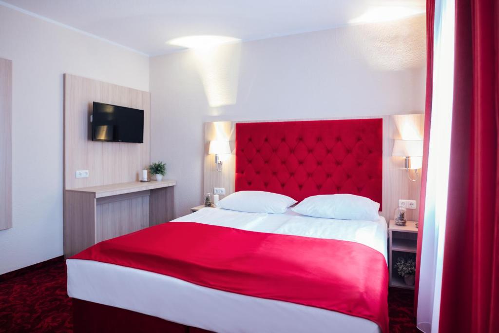 Postel nebo postele na pokoji v ubytování Hotel CULT Hamburg