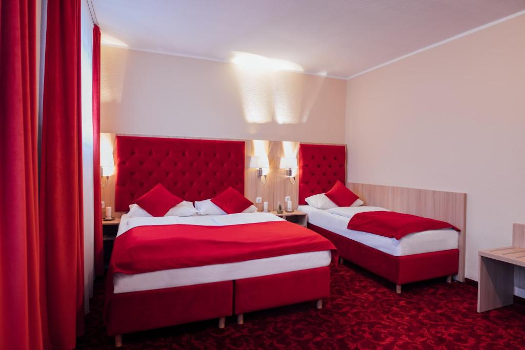 Postel nebo postele na pokoji v ubytování Hotel CULT Hamburg