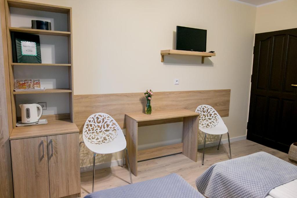Posteľ alebo postele v izbe v ubytovaní Eko Hotel Na Wierzynka & Park Pinokia