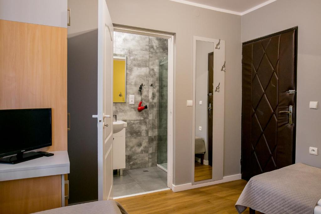 Kúpeľňa v ubytovaní Eko Hotel Na Wierzynka & Park Pinokia