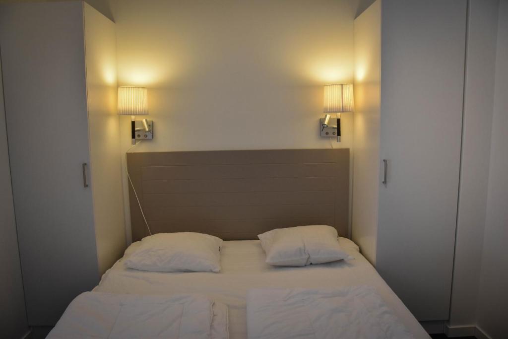 Postel nebo postele na pokoji v ubytování Ski Lodge Funäsdalen