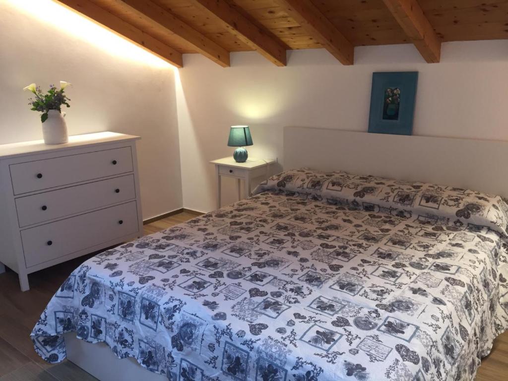 Postel nebo postele na pokoji v ubytování Agriturismo SanCristoforo