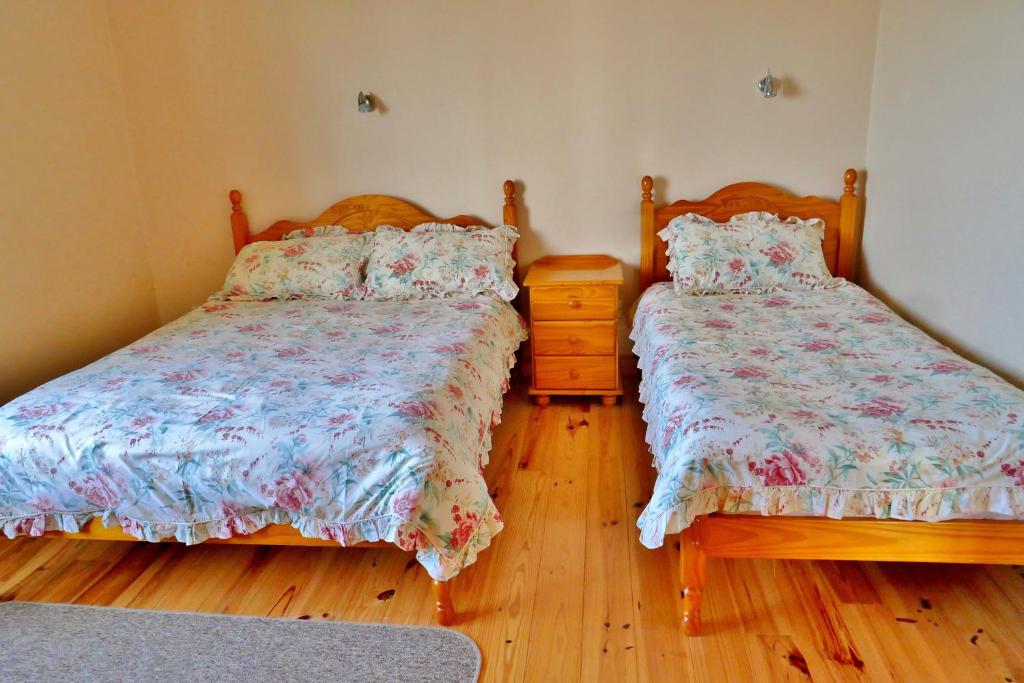 Postel nebo postele na pokoji v ubytování Cois Farraige