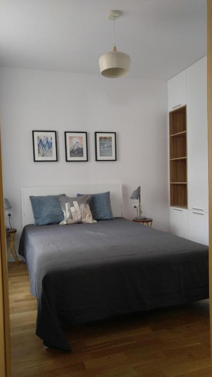 Posteľ alebo postele v izbe v ubytovaní Stylowy 2-pokojowy apartament 5 min. od Rynku