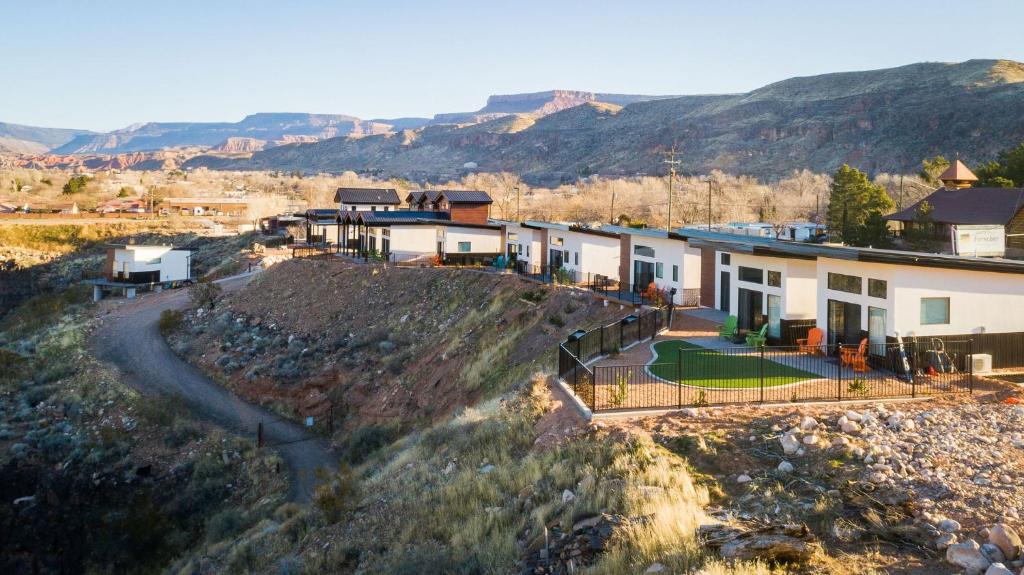 an aerial view of a house with mountains in the background at The Dwellings in La Verkin