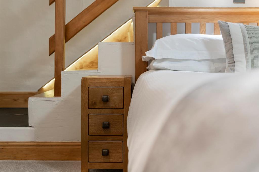 Postel nebo postele na pokoji v ubytování Melrose Guesthouse