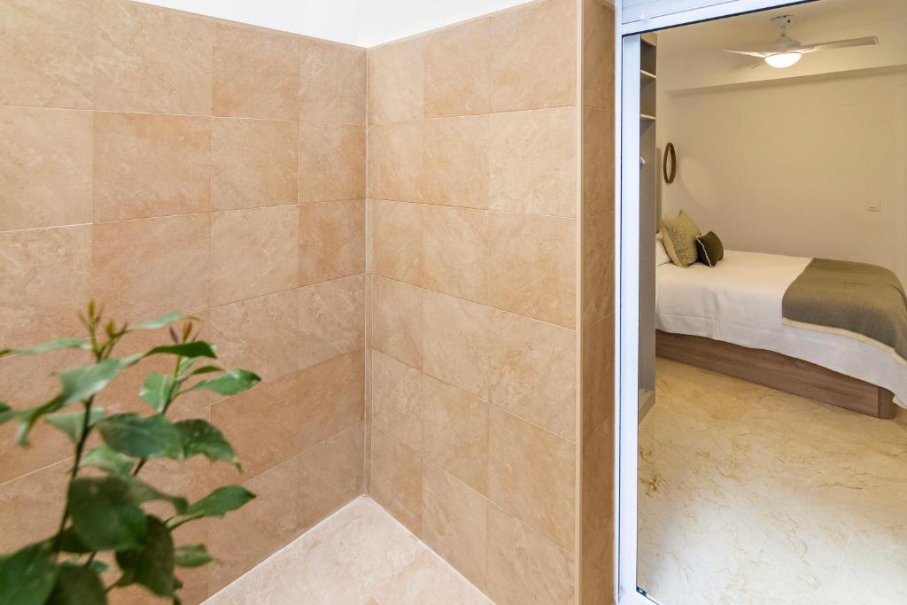 Posteľ alebo postele v izbe v ubytovaní Apartamento Emilio Luque Cinco