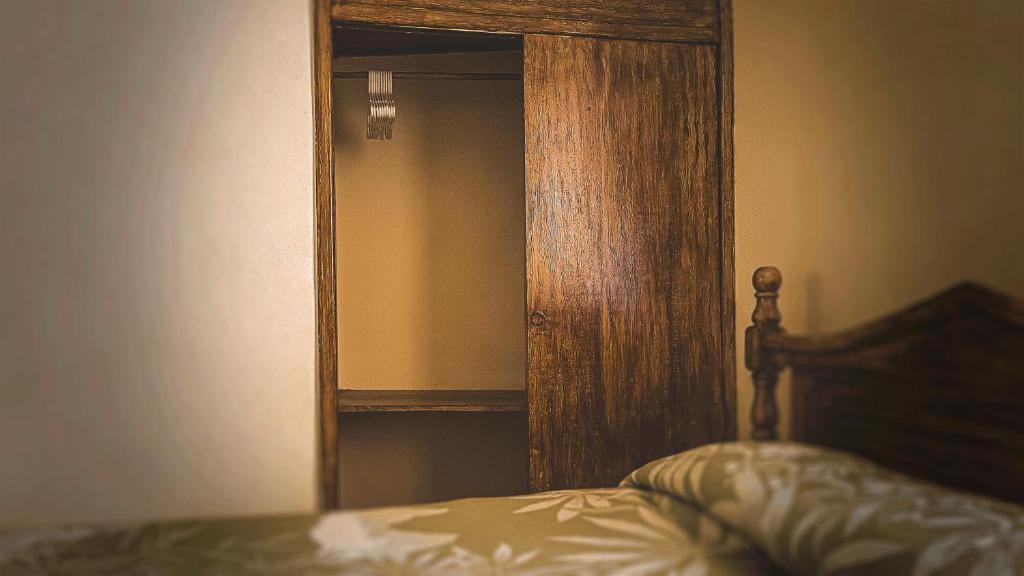 Postel nebo postele na pokoji v ubytování Hotel Alhóndiga