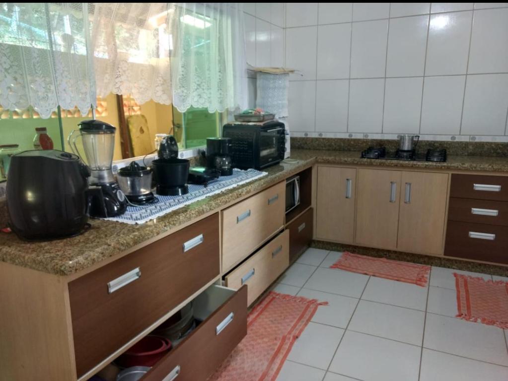  Casa com vista na rua Jequitibá