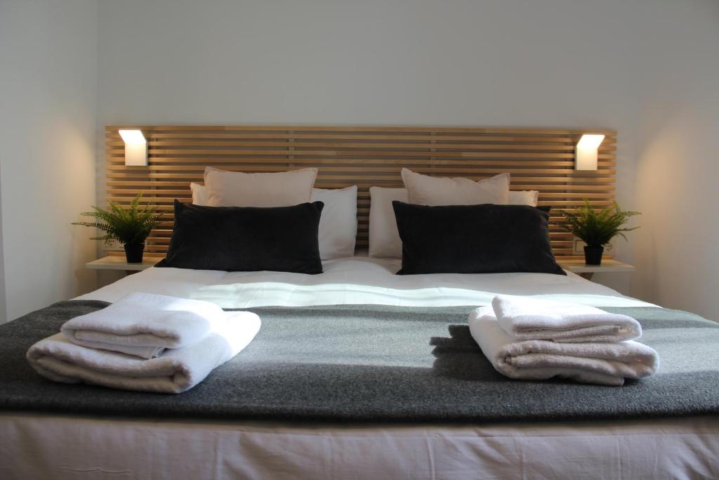 Ένα ή περισσότερα κρεβάτια σε δωμάτιο στο Apartamentos rurales PATXILLABORDA