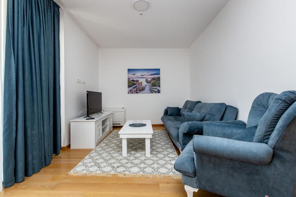 O zonă de relaxare la Apartments LORA in Apart-hotel