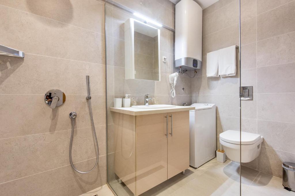O baie la Apartments LORA in Apart-hotel
