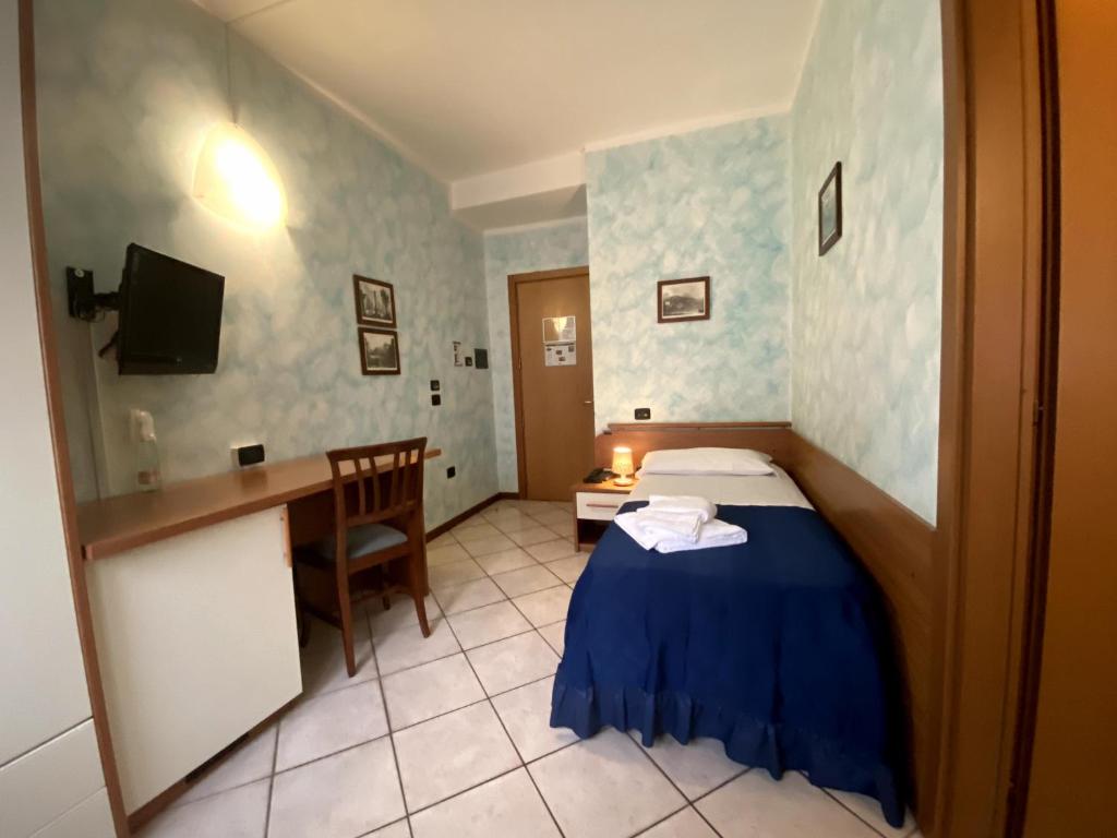 Postel nebo postele na pokoji v ubytování Sole della Franciacorta - Hotel & Restaurant