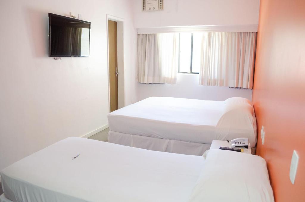 Postel nebo postele na pokoji v ubytování Bahia Sol e Mar