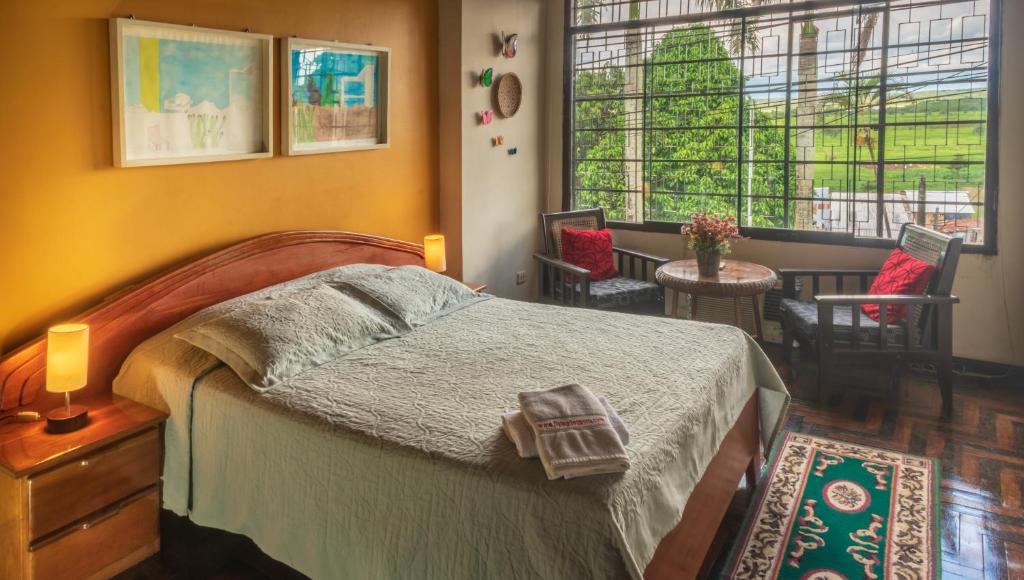 Postel nebo postele na pokoji v ubytování Flying Dog Hostel Iquitos