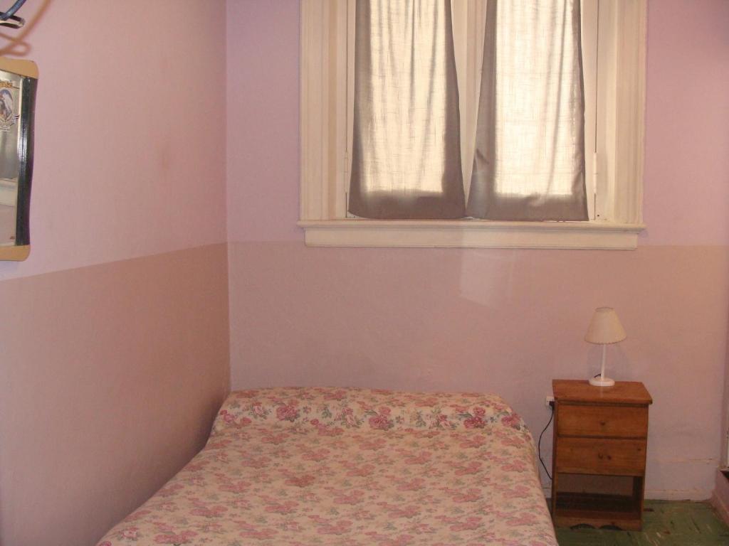 Postel nebo postele na pokoji v ubytování Hotel O'Rei