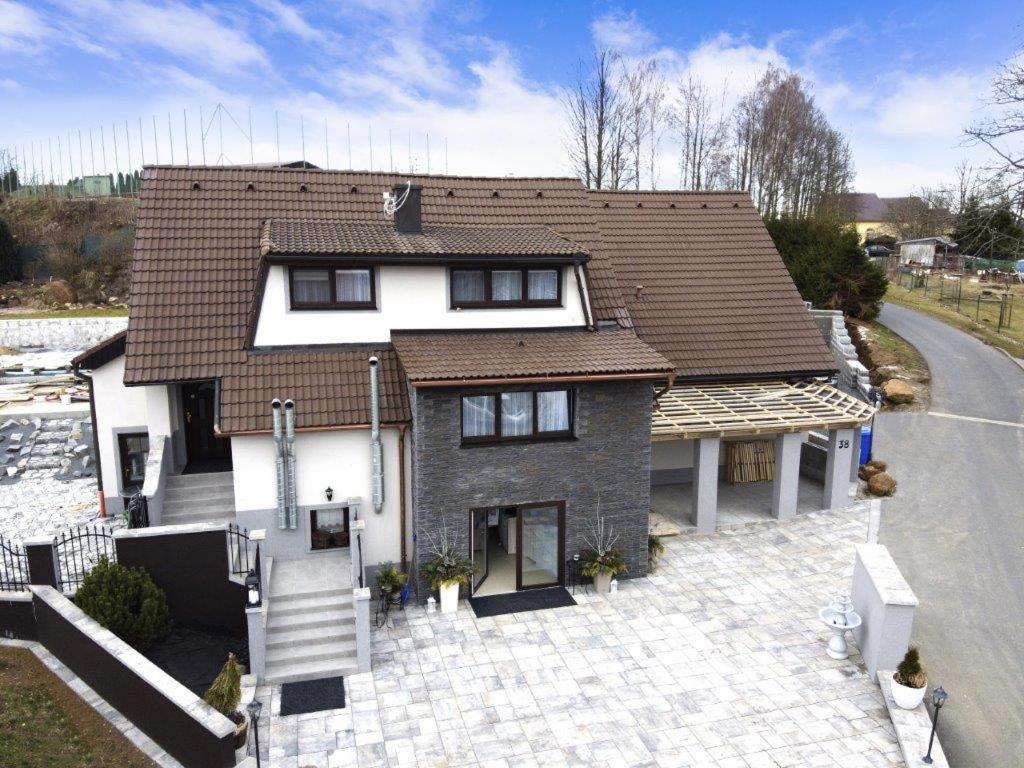 an aerial view of a house with a roof at Villa May Way in Rozvadov