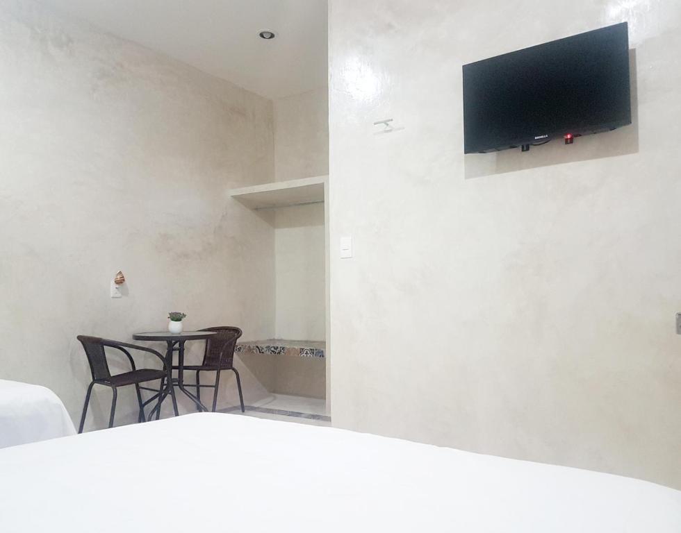 TV a/nebo společenská místnost v ubytování Casa Chujuk by Spirit Group
