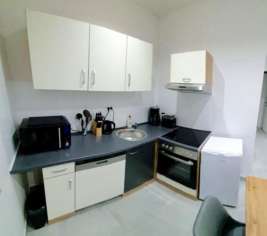 Kuchyň nebo kuchyňský kout v ubytování Villa Marija