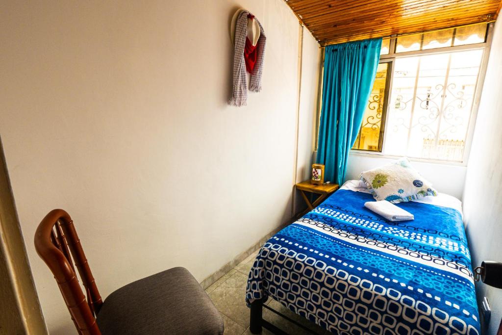 Voodi või voodid majutusasutuse Casa Campesina Hostel toas