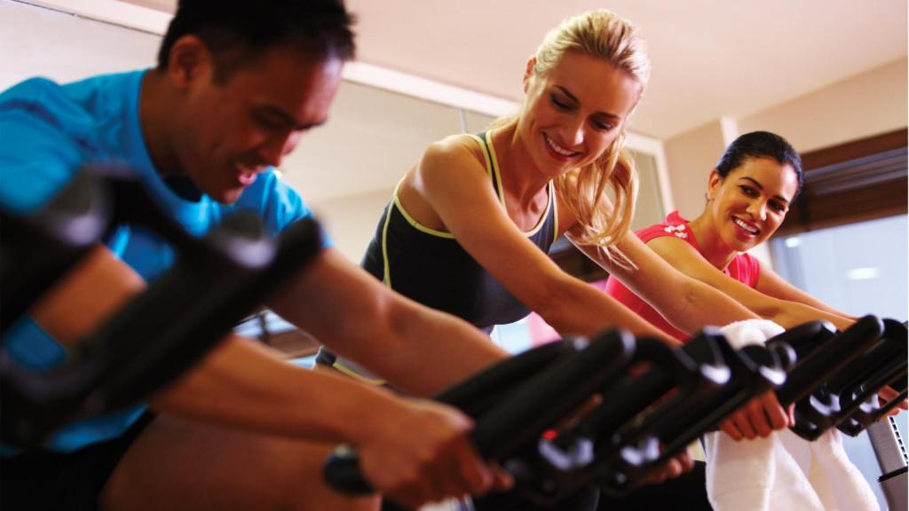 a group of people in a gym at Crowne Plaza Bahrain by IHG in Manama