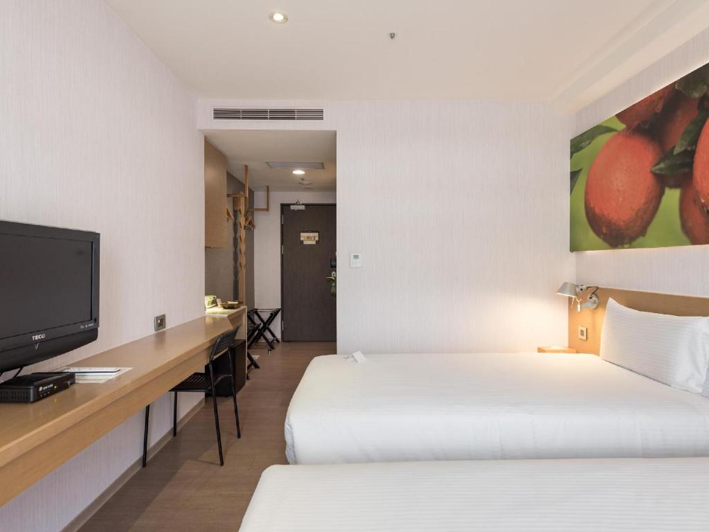 TV a/nebo společenská místnost v ubytování Mellow Fields Hotel
