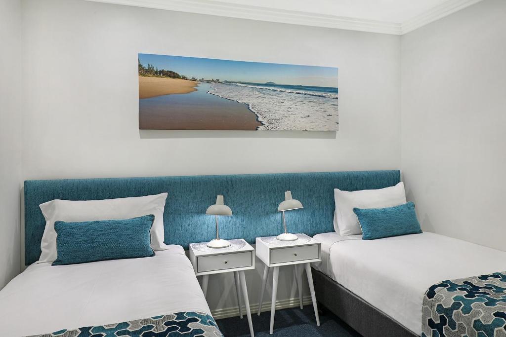 Postel nebo postele na pokoji v ubytování Watermark Resort Caloundra