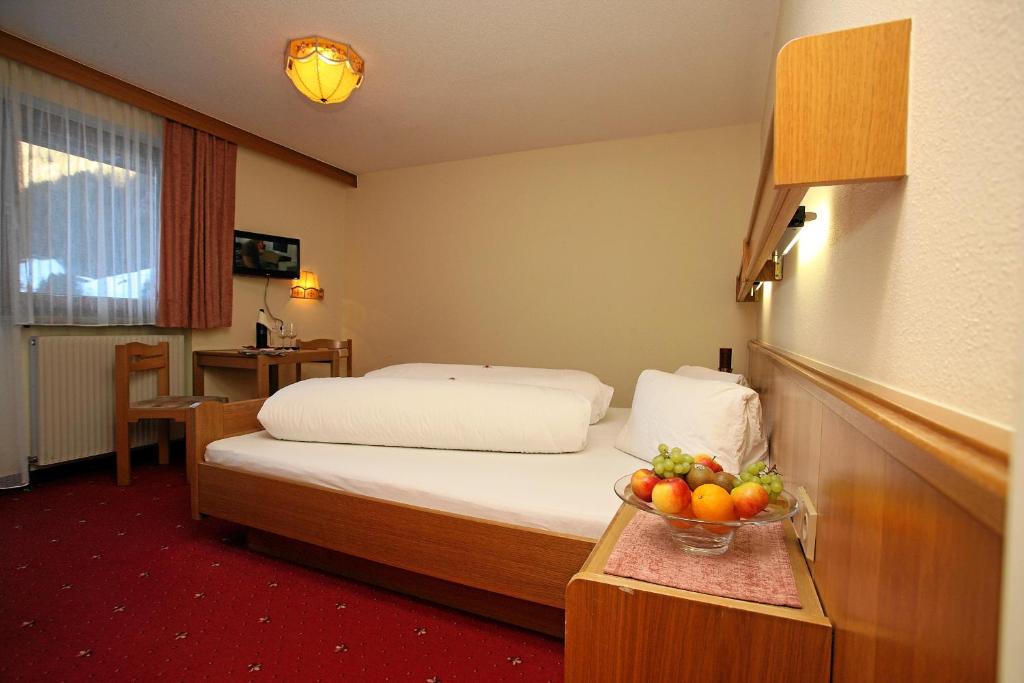 Postel nebo postele na pokoji v ubytování Hotel Wiese