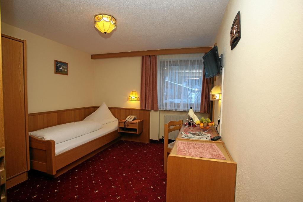 Postel nebo postele na pokoji v ubytování Hotel Wiese
