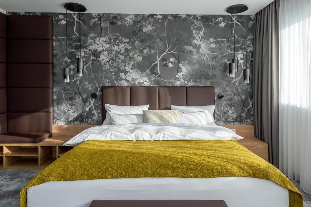 Ein Bett oder Betten in einem Zimmer der Unterkunft Hotel Esplanade Dortmund
