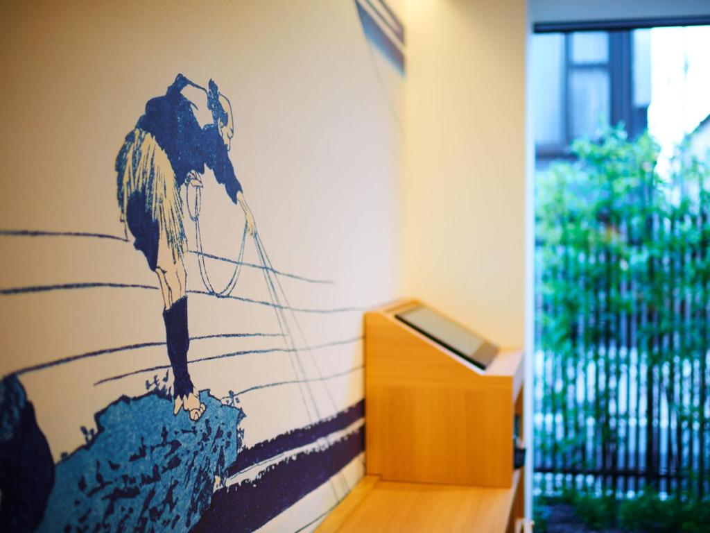 Posezení v ubytování Super Hotel Shinagawa Shinbanba