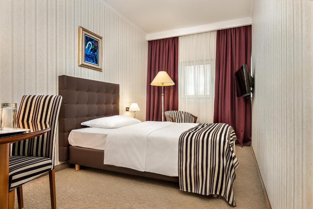 Cama ou camas em um quarto em Hotel Dubrovnik