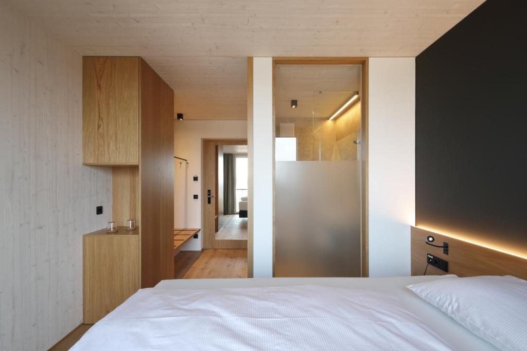 Postel nebo postele na pokoji v ubytování 2ND HOME HOTEL