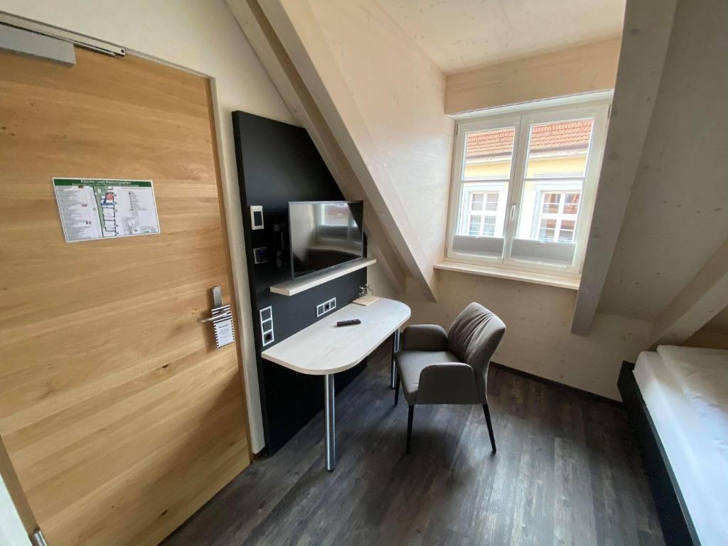 TV a/nebo společenská místnost v ubytování Stadthotel Haslach