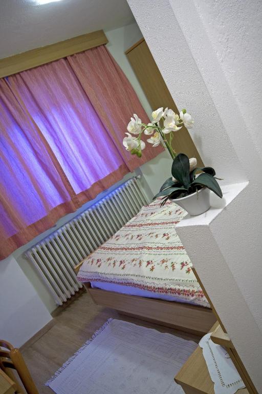 Postel nebo postele na pokoji v ubytování Hotel La Molinella