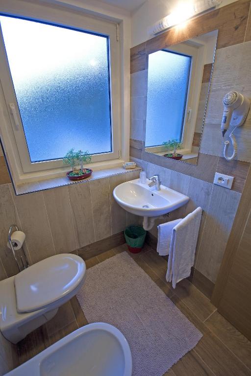 Koupelna v ubytování Hotel La Molinella